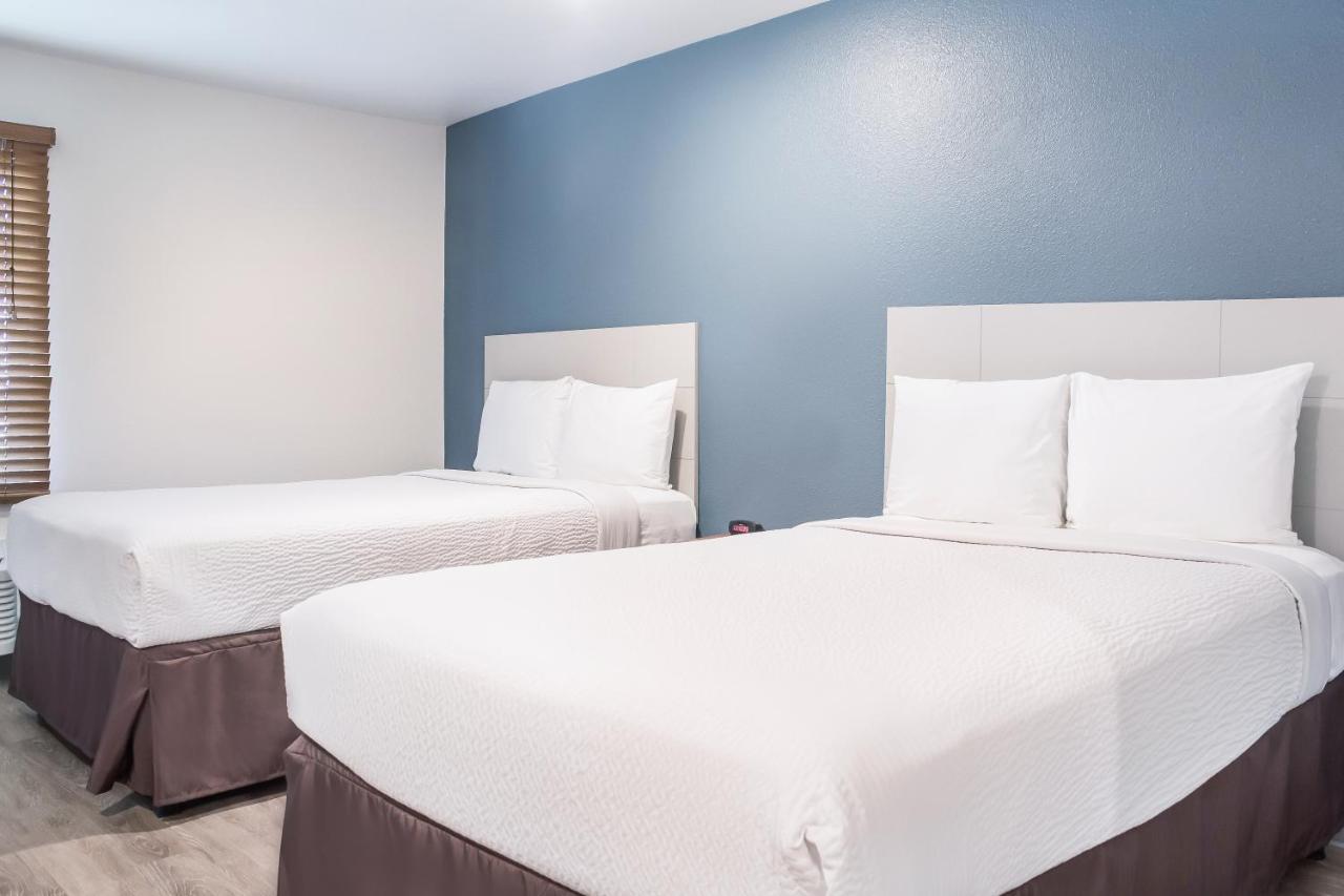 Woodspring Suites Conroe Exterior foto
